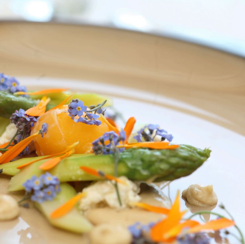 Plate of local asparagus. Penny Ericson, Author - food is the key to healthy longevity