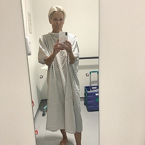 Sarah in a hospital gown