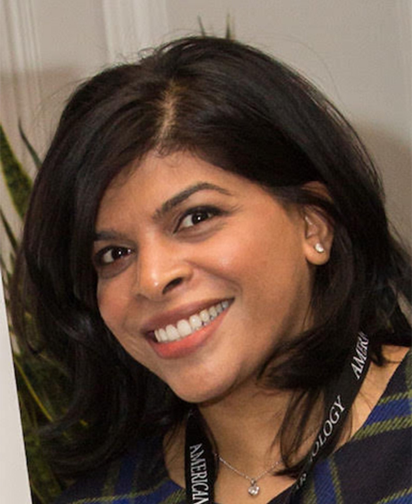 A smiling Dr SivaTharshini Ramalingam – BSc MB BS MRCP MRCGP DRCOG DCM